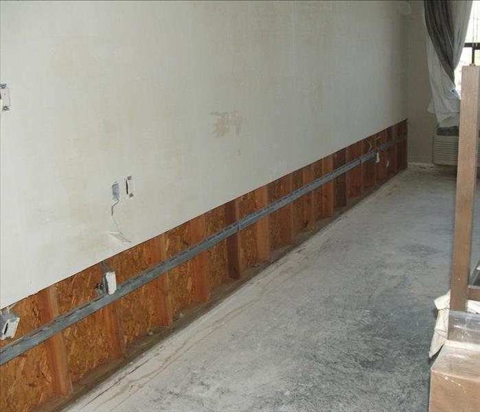 Flood cuts and flooring removed in home.