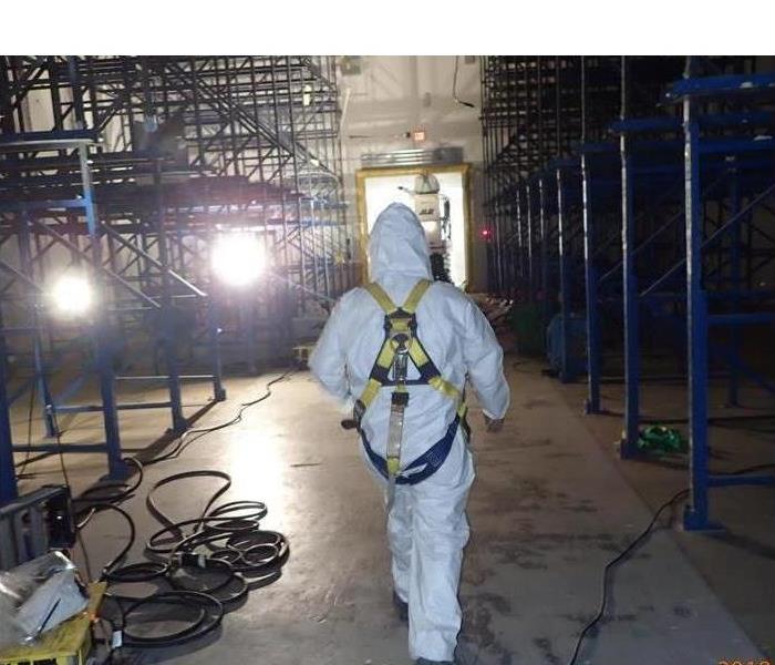 man in suit ready for cleaning